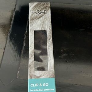 SHE clip and go 100% Remy Human Hsit extension.  18” length.